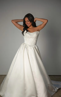 33631 - Strapless Grand Satin Ballgown Wedding Dress with Cat-Eye Neckline and Sculpted Pleats