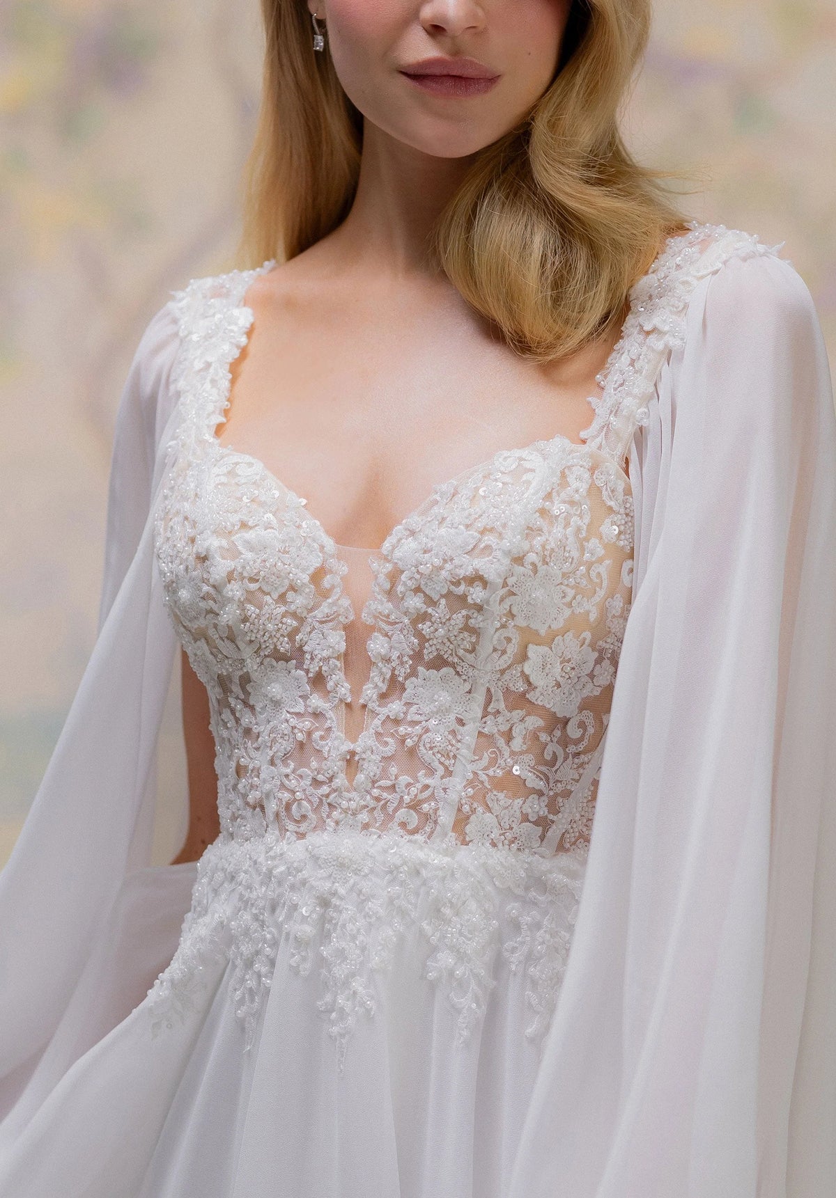 34763-A-line Wedding Dress has a Sheer, Boned Bodice with a Plunging Sweetheart Neckline