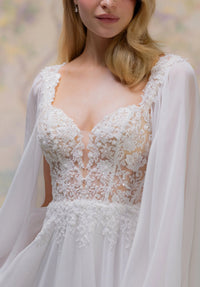 34763-A-line Wedding Dress has a Sheer, Boned Bodice with a Plunging Sweetheart Neckline