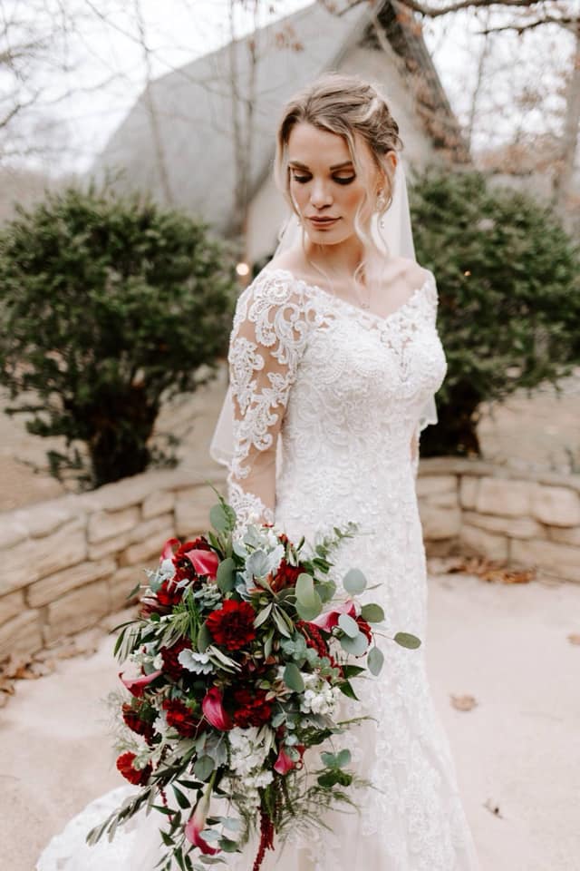 Long sleeve lace wedding gown with high neckline