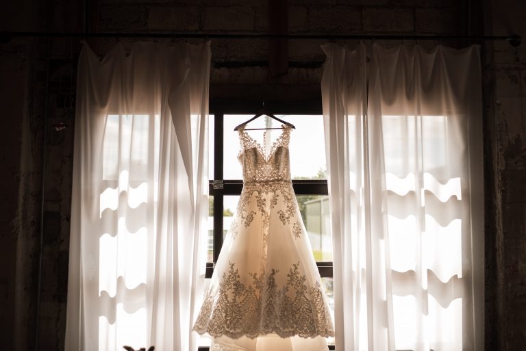 A hanging wedding gown.