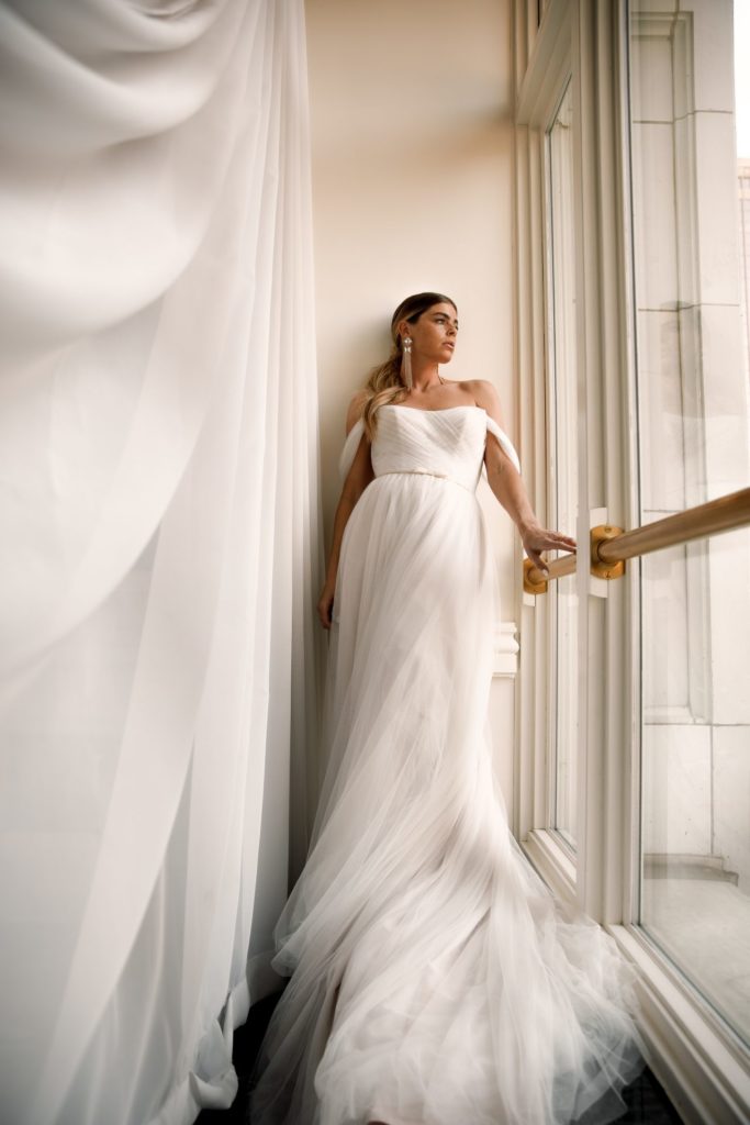 Bride wearing an elegant timeless wedding dress | Normans Bridal