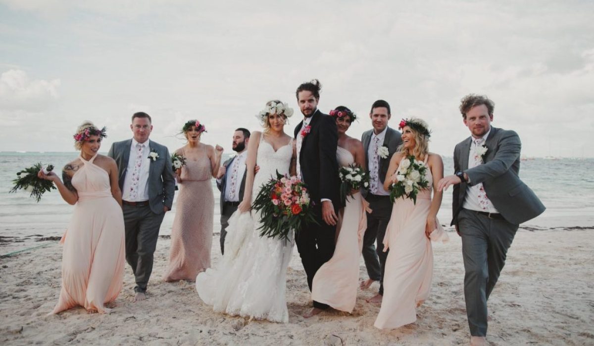 A Norman's bride and her wedding party on the beach.